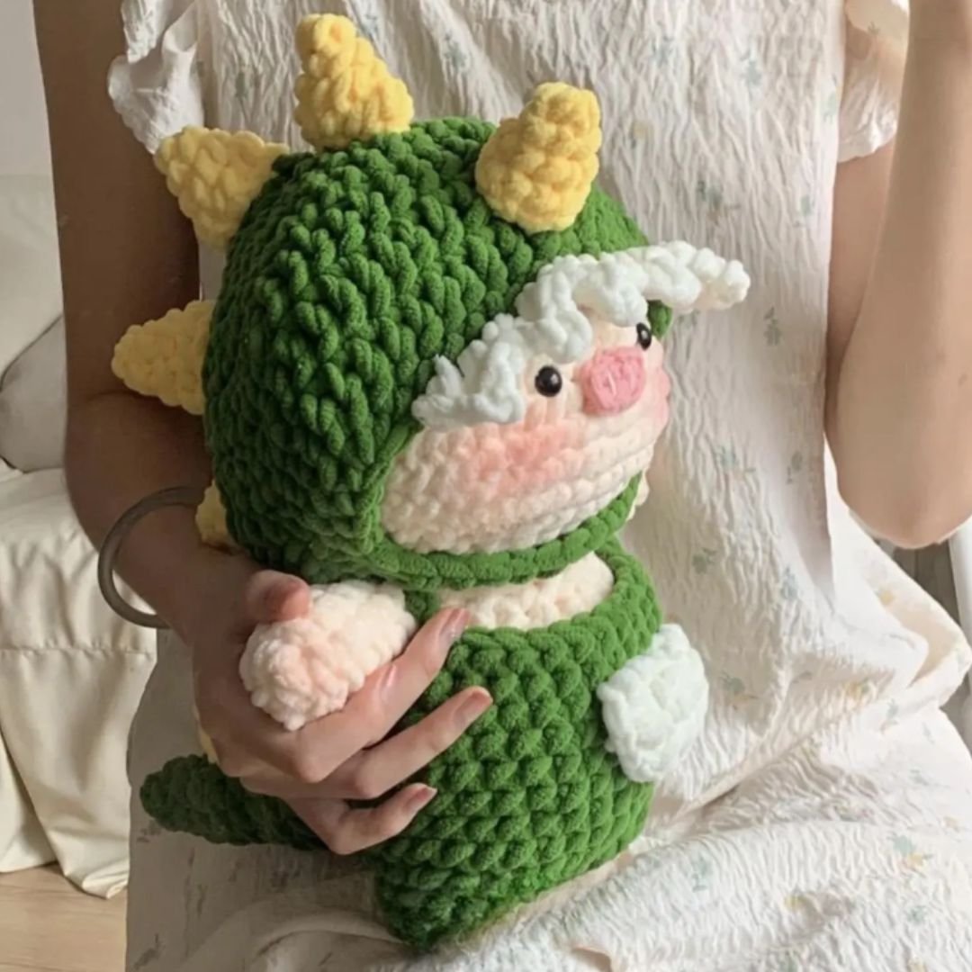 pig in dinosaur costume crochet pattern